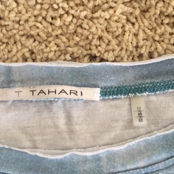 Tank top with a knot on the bottom side. - Picture 2 of 2